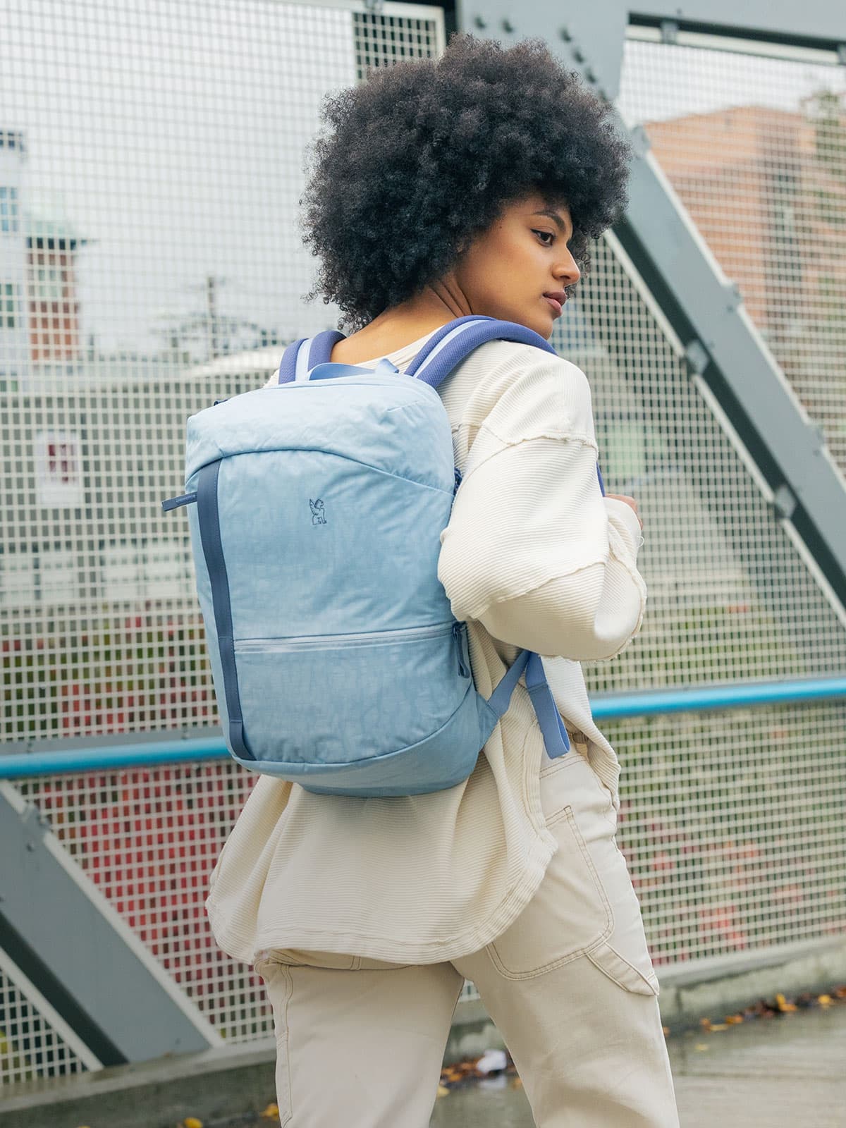 The Camden backpack in Ice Shadow on a woman